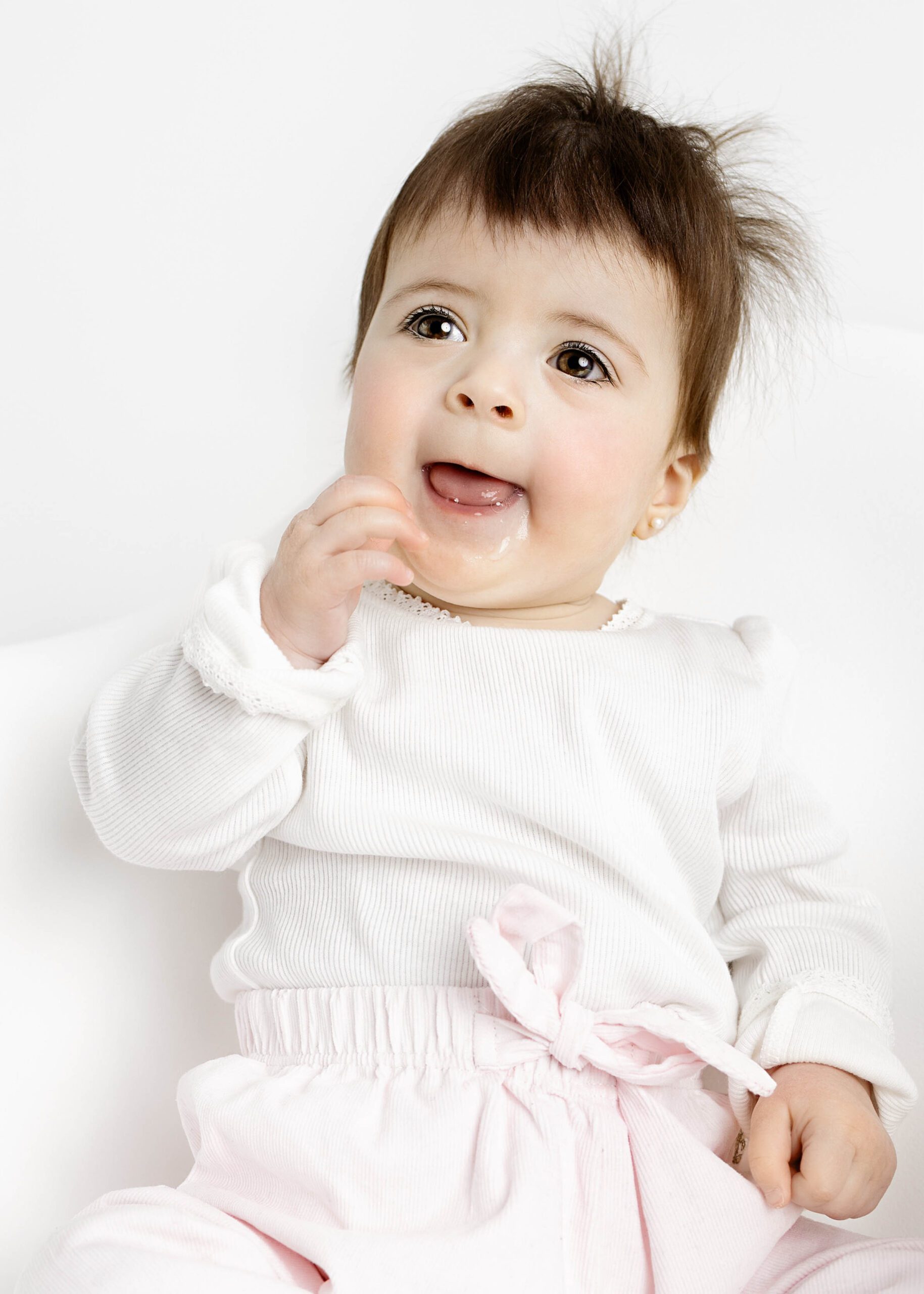 baby girl giggling by baby photography dallas